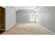 Bright bedroom with neutral carpet and large windows at 7310 Brightwater Oaks Dr, Tampa, FL 33625