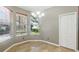 Cozy breakfast nook with tile flooring, large windows, and natural light at 7310 Brightwater Oaks Dr, Tampa, FL 33625