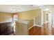 Hallway with hardwood floors and natural light at 7310 Brightwater Oaks Dr, Tampa, FL 33625