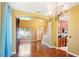 Spacious living room with hardwood floors leading to the dining and kitchen areas at 7310 Brightwater Oaks Dr, Tampa, FL 33625