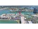 An aerial view highlights the building's location within a waterfront community at 7625 Sun Island S Dr # 106, South Pasadena, FL 33707