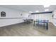 Spacious game room featuring ping pong tables and a bright, well-lit atmosphere for recreation and leisure at 7625 Sun Island S Dr # 106, South Pasadena, FL 33707