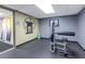 Exercise room with machines and a shower area, providing convenience for a complete fitness experience at 7625 Sun Island S Dr # 106, South Pasadena, FL 33707