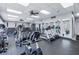 Bright gym with treadmills, elliptical machines, and mirrors for a motivating workout experience at 7625 Sun Island S Dr # 106, South Pasadena, FL 33707