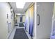 Clean shower area with individual stalls, offering convenience and privacy for residents after a workout at 7625 Sun Island S Dr # 106, South Pasadena, FL 33707