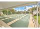 Outdoor shuffleboard courts offer recreational space and activity for residents at 7625 Sun Island S Dr # 106, South Pasadena, FL 33707