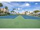 Outdoor tennis courts on a sunny day, perfect for recreational play at 7625 Sun Island S Dr # 106, South Pasadena, FL 33707