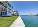 Waterfront condo complex, with grassy area at 7625 Sun Island S Dr # 106, South Pasadena, FL 33707