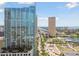 High-rise building is captured from a high-angle aerial view showcasing a water view of the city skyline at 777 N Ashley Dr # 2603, Tampa, FL 33602