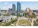 Beautiful high-rise building in a bustling urban environment with city park, palm trees and blue skies above at 777 N Ashley Dr # 2603, Tampa, FL 33602