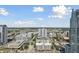 Aerial view showcases cityscape with roads, sidewalks, and lush greenery at 777 N Ashley Dr # 2603, Tampa, FL 33602