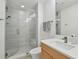 Modern bathroom with glass shower enclosure, white and gray tile, and contemporary fixtures at 777 N Ashley Dr # 2603, Tampa, FL 33602