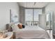 Modern bedroom with concrete accents, a balcony, and wood floors at 777 N Ashley Dr # 2603, Tampa, FL 33602
