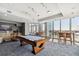 Bright game room featuring a pool table and city views at 777 N Ashley Dr # 2603, Tampa, FL 33602