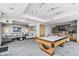 A modern game room offering both a pool table and comfortable seating for an evening of enjoyment at 777 N Ashley Dr # 2603, Tampa, FL 33602