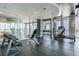 Bright fitness center with various weight machines, free weights, and expansive windows overlooking the cityscape at 777 N Ashley Dr # 2603, Tampa, FL 33602