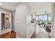 Hallway leading into condo featuring a sleek design, hardwood floors, and natural light, offering a welcoming atmosphere at 777 N Ashley Dr # 2603, Tampa, FL 33602