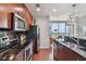 Open concept kitchen with stainless steel appliances and stunning city views at 777 N Ashley Dr # 2603, Tampa, FL 33602