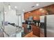 Modern kitchen with stainless steel appliances, dark backsplash, and beautiful countertops at 777 N Ashley Dr # 2603, Tampa, FL 33602