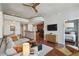 Open-concept living room flowing into the kitchen with wood floors and ample seating at 777 N Ashley Dr # 2603, Tampa, FL 33602