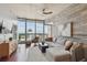 Bright living room features floor-to-ceiling windows with great views and sleek design at 777 N Ashley Dr # 2603, Tampa, FL 33602