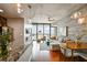 Open-concept living room boasting hardwood floors, modern furnishings, city views, and lots of natural light at 777 N Ashley Dr # 2603, Tampa, FL 33602
