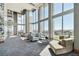 Bright lounge area with floor to ceiling windows and views of the city at 777 N Ashley Dr # 2603, Tampa, FL 33602