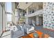 Elegant multi-level lounge with plenty of natural light, a spiral staircase and comfortable seating at 777 N Ashley Dr # 2603, Tampa, FL 33602