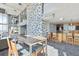 Open lounge featuring a large dining table, bar area, spiral staircase and access to gym at 777 N Ashley Dr # 2603, Tampa, FL 33602
