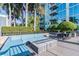 Relax in style on the outdoor lounge with a fire pit, surrounded by tropical landscaping and city vistas at 777 N Ashley Dr # 2603, Tampa, FL 33602
