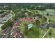 Beautiful aerial view of condo community featuring a pool, golf course, and lush landscaping at 8005 Bardmoor Pl # 102I, Seminole, FL 33777