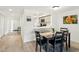 Cozy dining area adjacent to the kitchen features modern appliances and ample natural light at 8005 Bardmoor Pl # 102I, Seminole, FL 33777