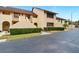 Exterior view of a multi-Gathering dwelling showcasing its architecture and surroundings at 8005 Bardmoor Pl # 102I, Seminole, FL 33777