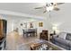 Open-concept living space with a dining area and a view of the front door and kitchen at 8005 Bardmoor Pl # 102I, Seminole, FL 33777