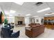Clubhouse with fireplace, lounge area, TV, and kitchenette offers a cozy and functional community space at 820 Hickory Ln, Palm Harbor, FL 34683