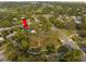 Charming home with manicured lawns and mature trees in a desirable neighborhood at 101 Ponce De Leon Blvd, Belleair, FL 33756