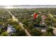 A tranquil home with pool surrounded by lush trees in a desirable neighborhood at 101 Ponce De Leon Blvd, Belleair, FL 33756