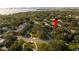 Beautiful home amidst lush surroundings with inviting street appeal and serene setting at 101 Ponce De Leon Blvd, Belleair, FL 33756
