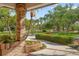 Well-manicured front yard with beautiful landscaping and a welcoming walkway to the home at 101 Ponce De Leon Blvd, Belleair, FL 33756