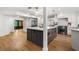 Spacious kitchen with a large center island, stainless steel appliances, and modern finishes at 101 Ponce De Leon Blvd, Belleair, FL 33756
