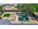 Aerial view of the property showcasing the spacious backyard, lush greenery, and overall layout at 10931 110Th Ave, Seminole, FL 33778