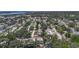 Overhead shot shows a residential area with tree-lined streets and well-kept homes, promoting a sense of community at 10931 110Th Ave, Largo, FL 33778