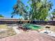Large backyard featuring a patio area, lush greenery, and ample space for recreation at 10931 110Th Ave, Seminole, FL 33778