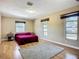 Spacious bedroom with hardwood floors, ample natural light, and neutral paint at 10931 110Th Ave, Seminole, FL 33778