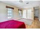 Bright bedroom features hardwood floors, with closet space and a window with lots of light at 10931 110Th Ave, Seminole, FL 33778