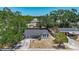 Charming home exterior with mature trees offers a cozy curb appeal in a well-established neighborhood near street at 10931 110Th Ave, Seminole, FL 33778