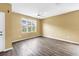 Bright bedroom with modern ceiling fan and large window with view of the neighborhood at 1116 Martin Luther King Jr Ave, Dunedin, FL 34698