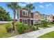 Desirable townhome featuring a landscaped yard and beautiful curb appeal at 1116 Martin Luther King Jr Ave, Dunedin, FL 34698