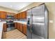 Modern kitchen features stainless steel appliances and colorful backsplash at 1116 Martin Luther King Jr Ave, Dunedin, FL 34698
