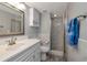 Updated bathroom featuring a walk-in shower, modern vanity, and a neutral color scheme for a clean aesthetic at 112 W Cypress Ct, Oldsmar, FL 34677